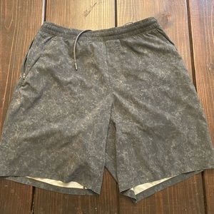 Lululemon T.H.E short. Size L. Liner-less 9”. Zipped back pocket. Dark green